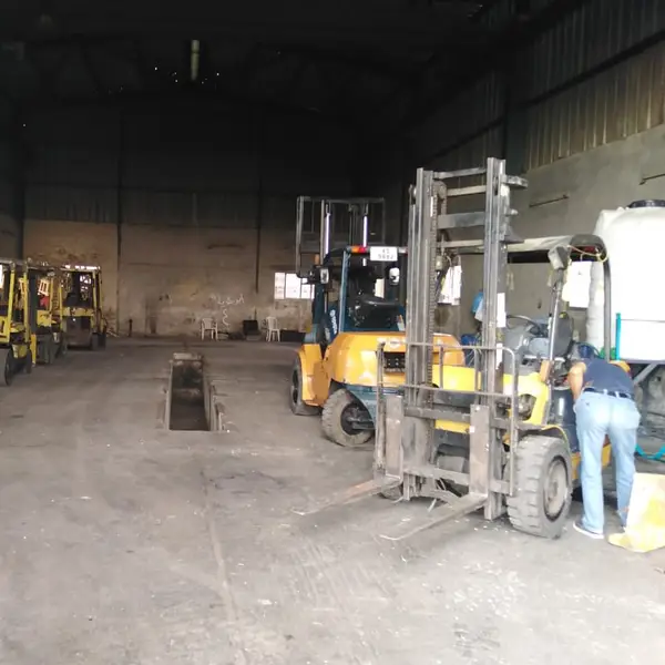 Forklift fleet under maintenance in the workshop