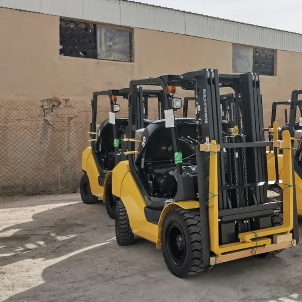 Newly delivered Komatsu forklifts awaiting commissioning